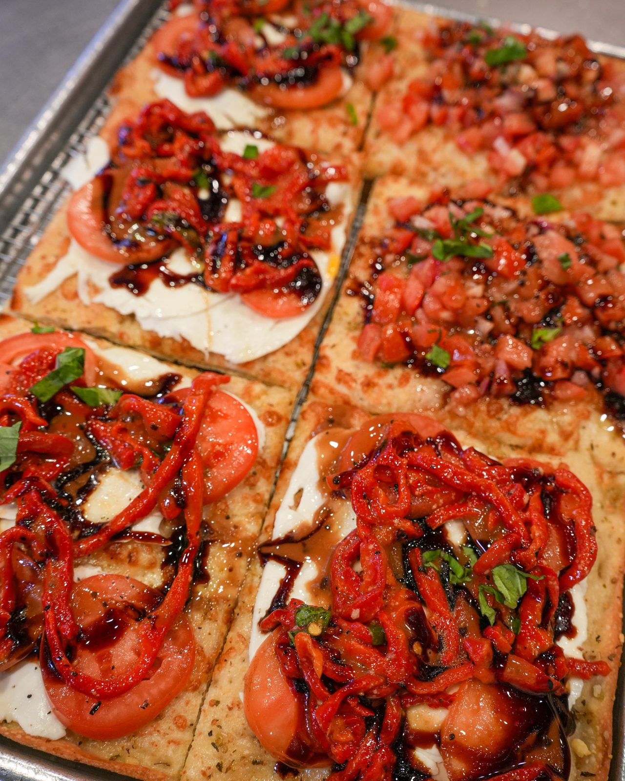 Crispino squares topped with bruschetta