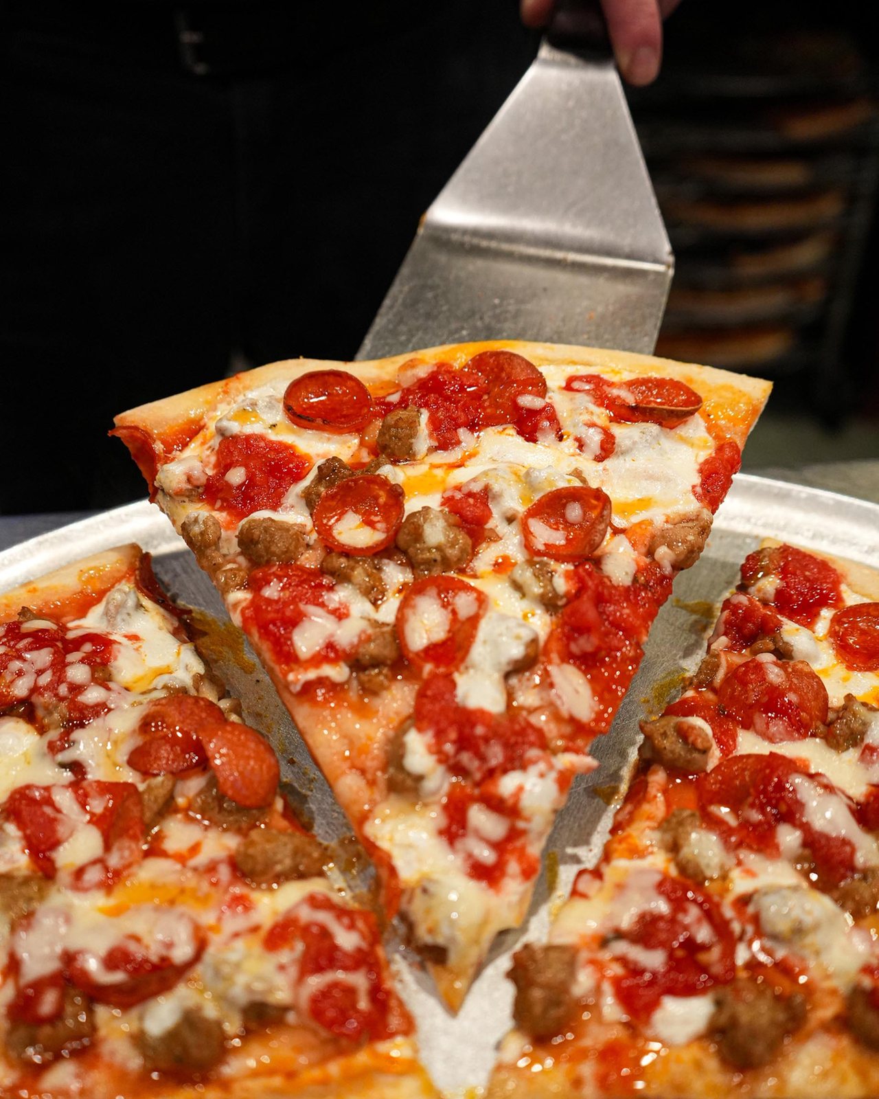 Meat lovers slice: pepperoni, sausage and meatball