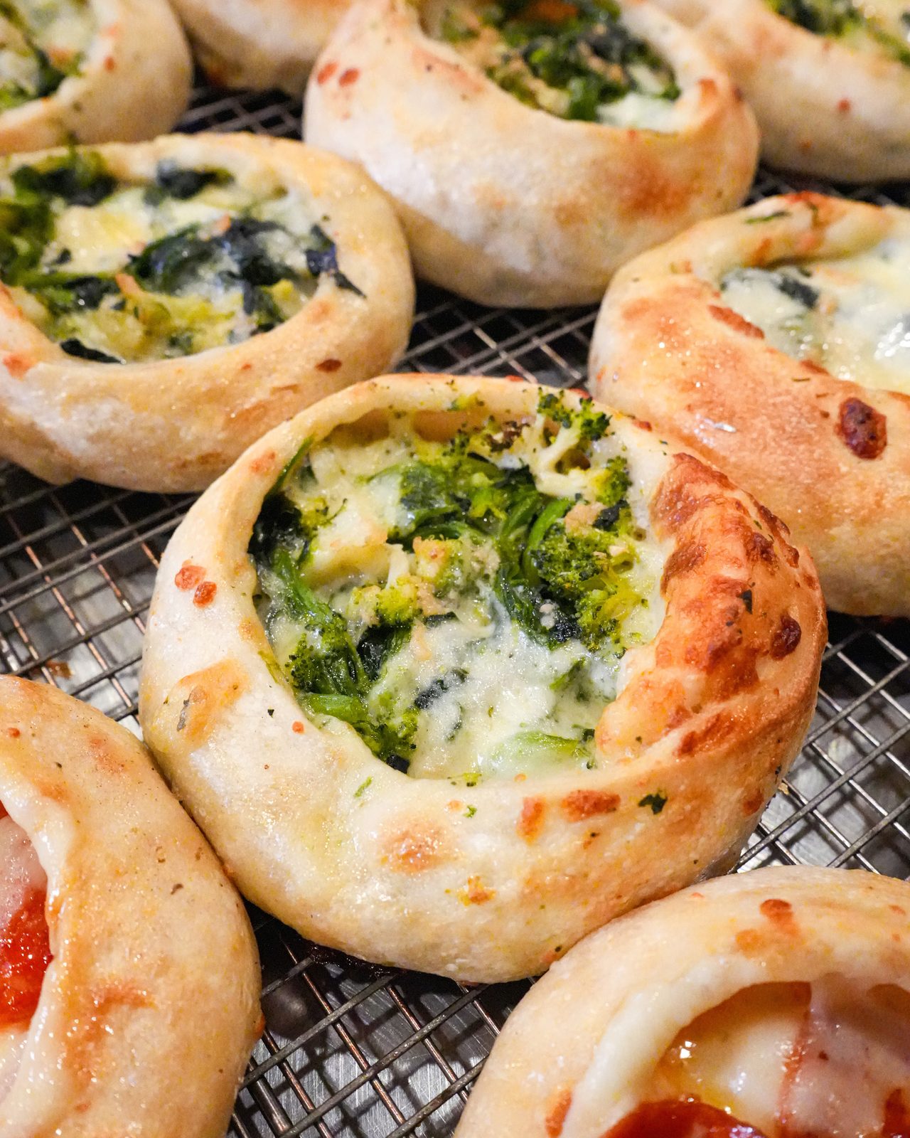 Spinach and pepperoni pinwheels on the rack