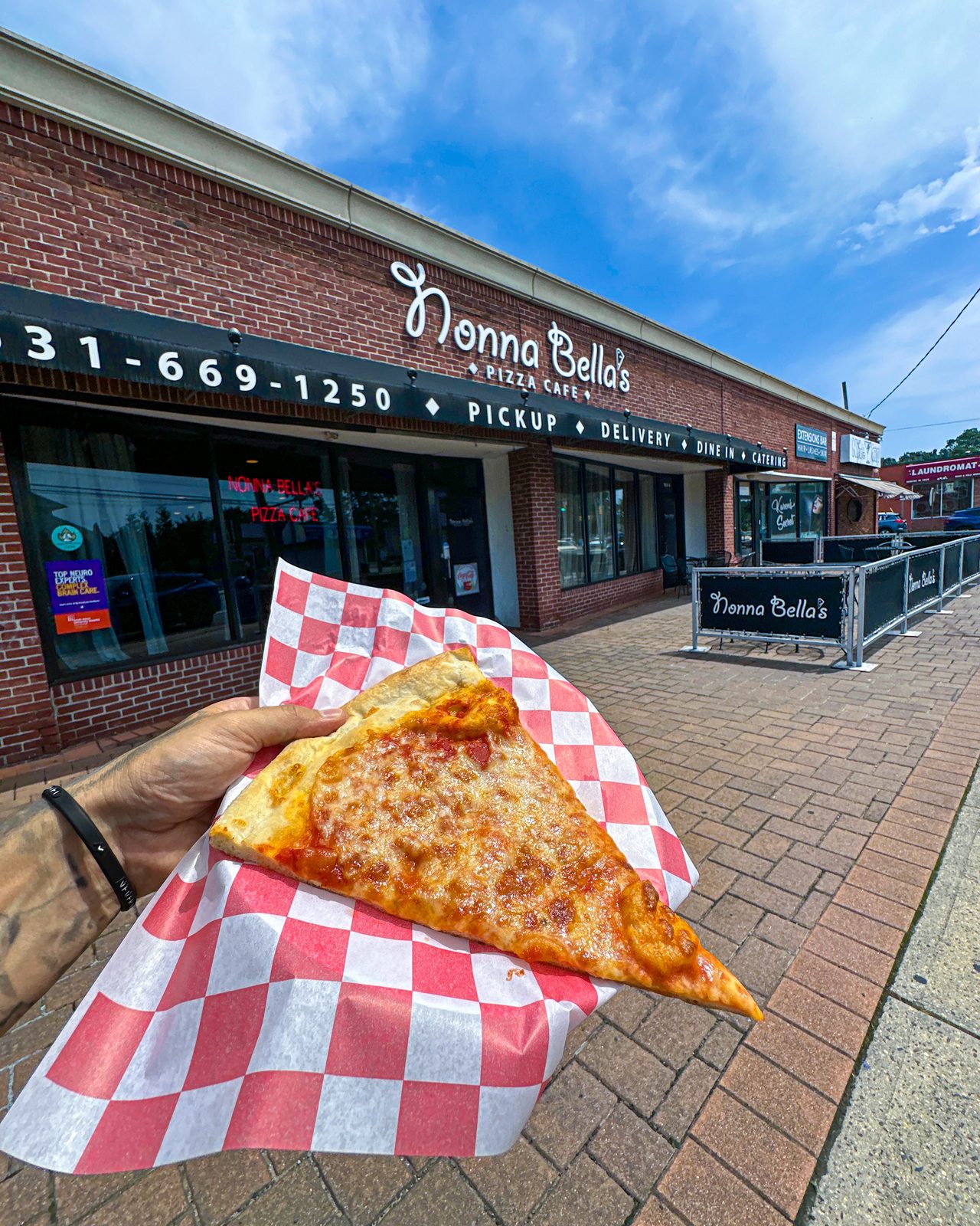 A slice out front on Deer Park Avenue