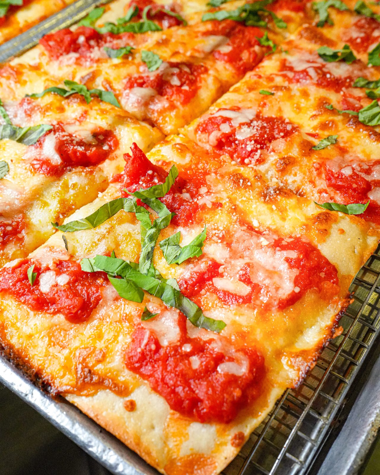 Square pie with tomato and fresh basil