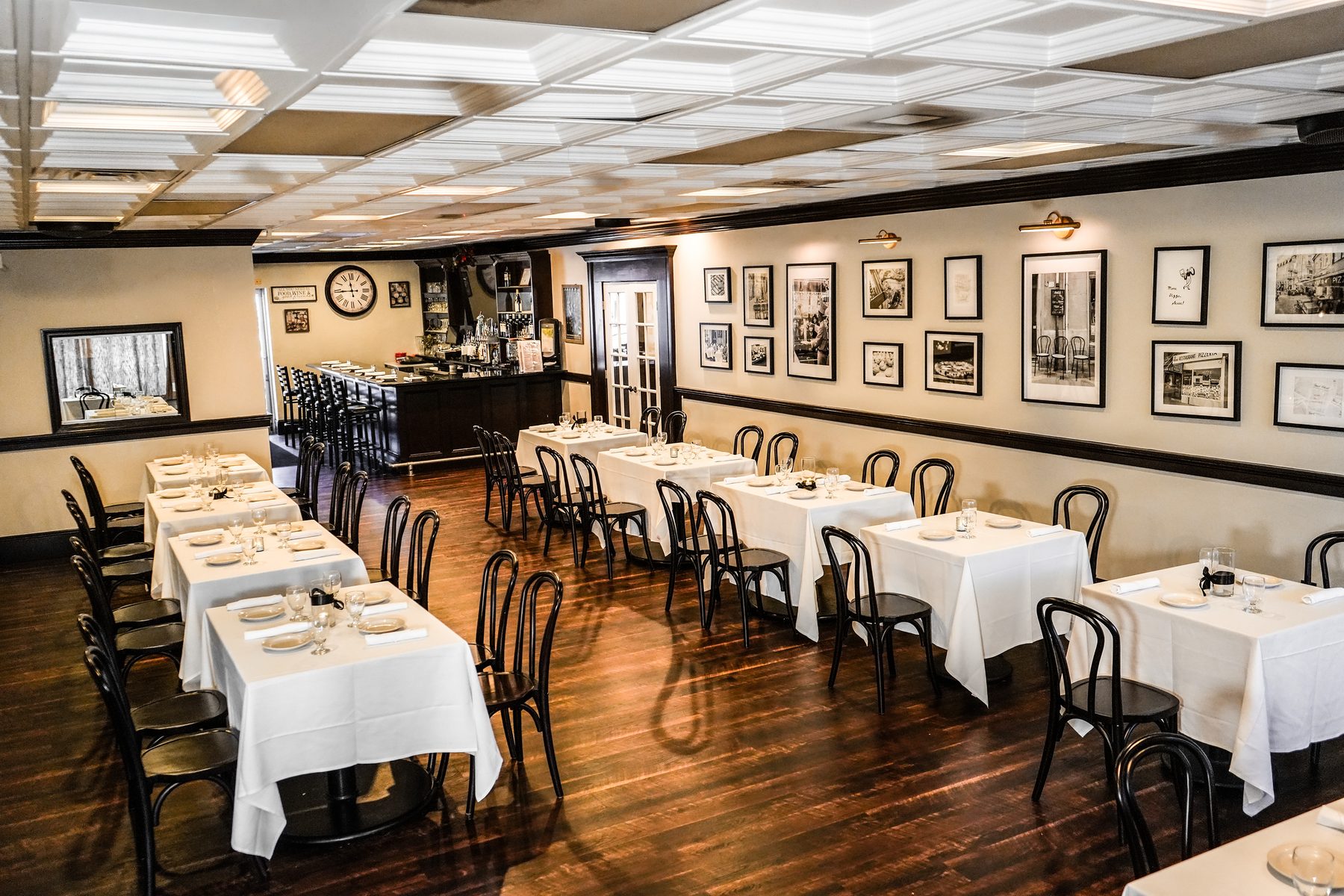The private dining room under a pressed tin ceiling